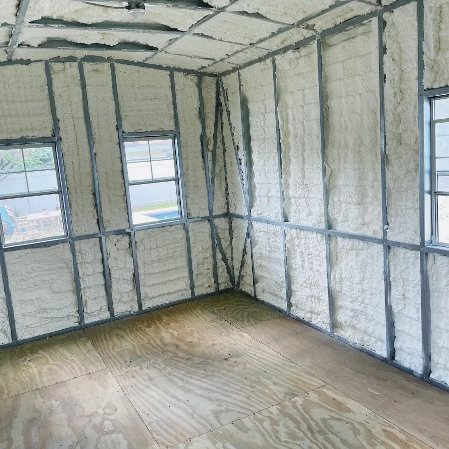 Closed-cell spray foam insulation applied to wall cavities in a residential project in Lower Oxford